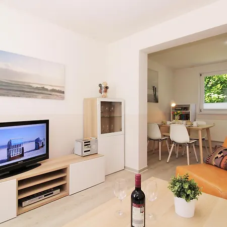 Haus Triton 1 Апартаменты Кюлунгсборн